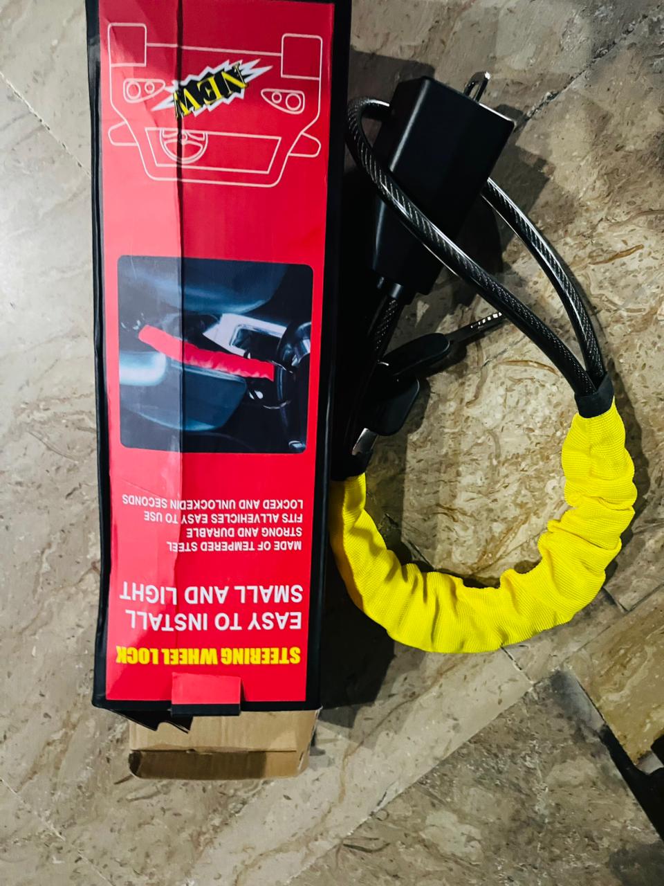 HEAVY-DUTY SEAT BELT STEERING WHEEL LOCK